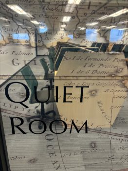 View of the Deep Quiet Room through the window showing the room label