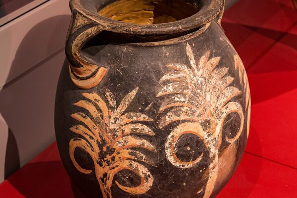 Photo of Minoan ovoid amphora with leafy pattern (maybe ferns) Made of pottery (clay) with dark (brown) painting on the unslipped buff surface - style / ware: Kamares style - period: middle minoan II B / protopalatial period (dating in the museum: 1800-1700 BC) -findspot: Phaistos, palace - museum / inventory number: Herakleion, Archaeological Museum - Please note: The above museum permits photography of its exhibits for private, educational, scientific, non-commercial purposes. If you intend to use the photo for any commercial aim, please contact the museum and ask for permission.