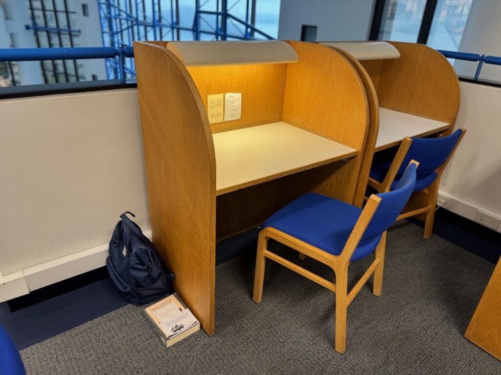 Photo of a cleared study carrel, with personal belongings removed