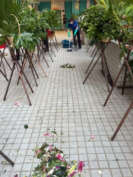 Cleaning lady cleaned up the environment after flower picking