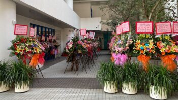 The flower baskets display outside the Library - view from the Atrium
