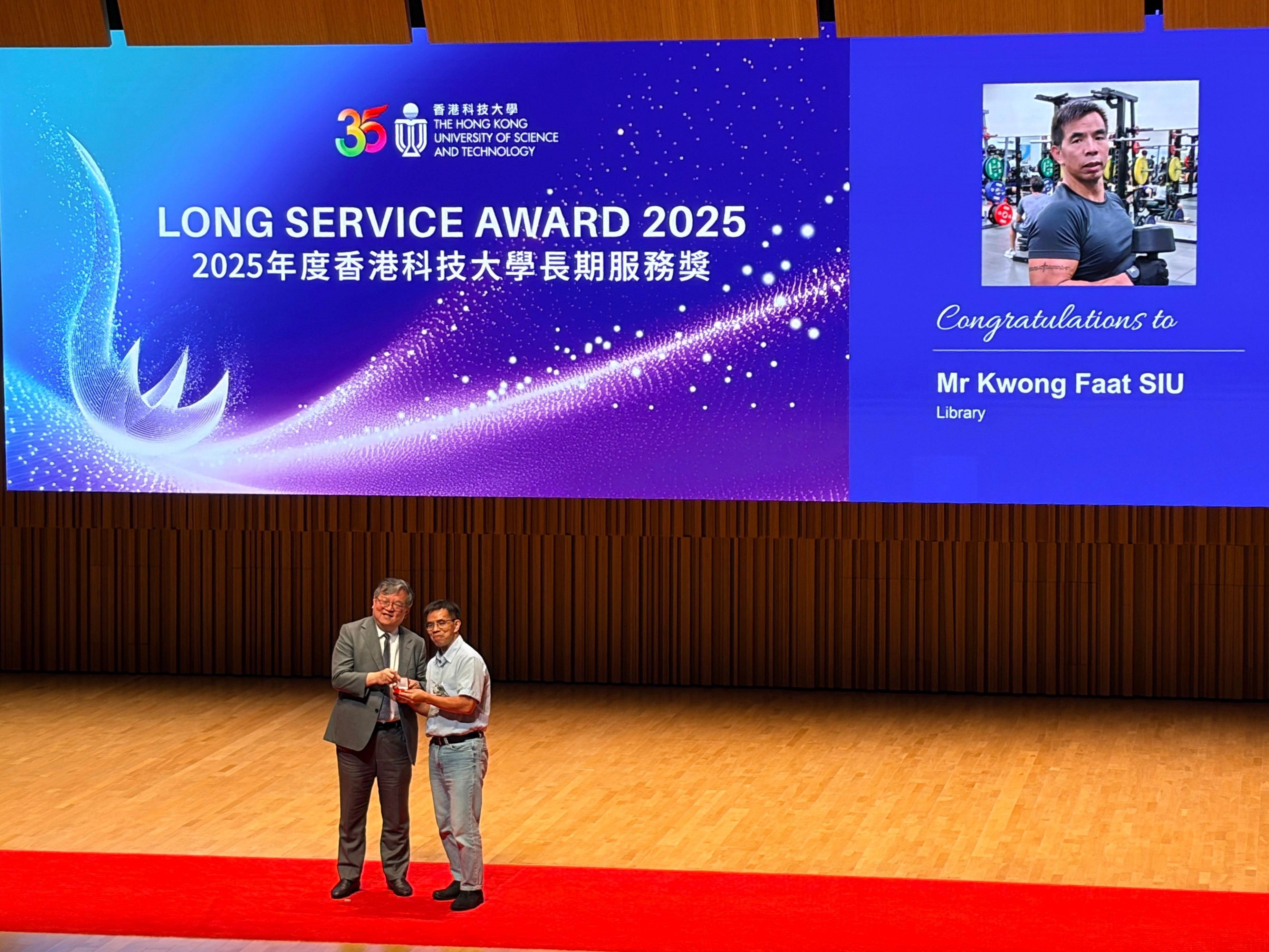 Faat receiving Long Service Award