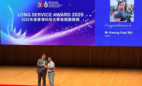 Faat receiving Long Service Award