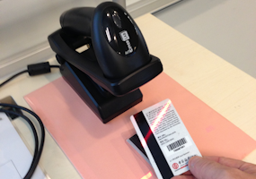photo of barcode scanner and HKUST i.d. card for attendance taking