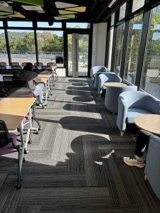 Photo of tables and chairs along LG5 walkway